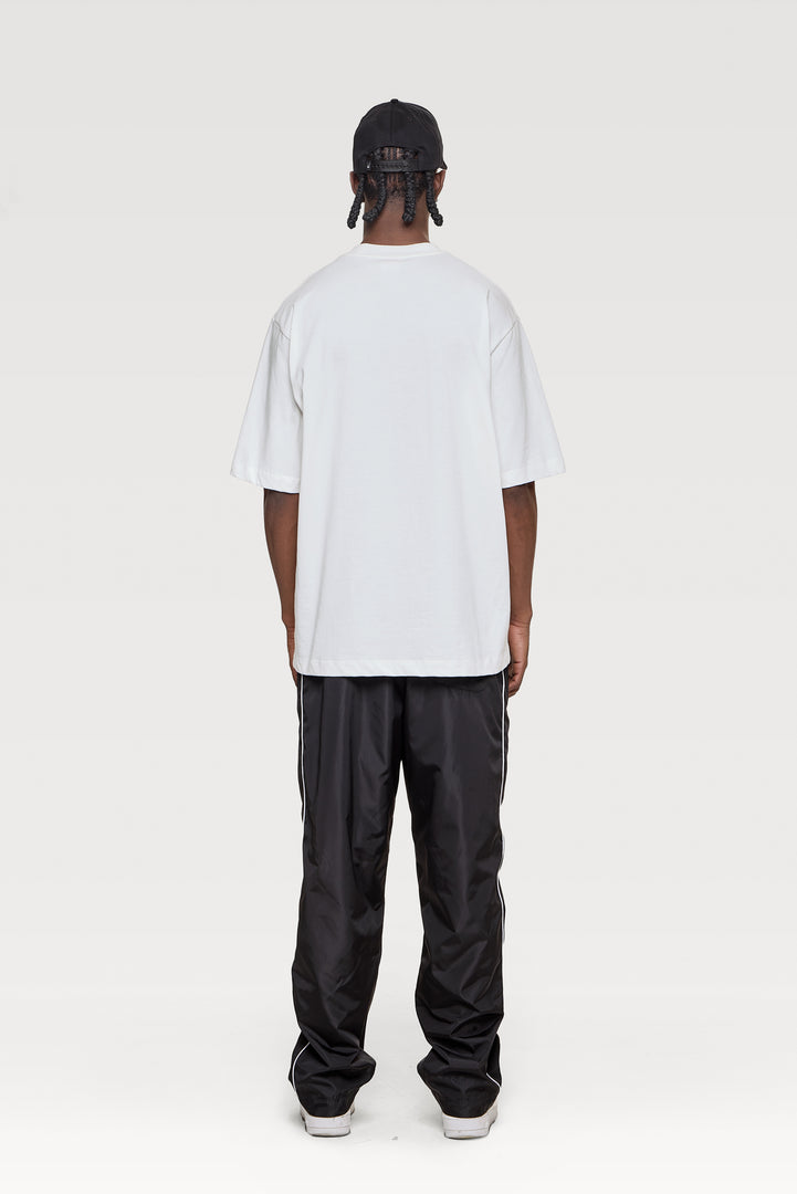 CAMISETA OVERSIZE LOCKED IN NEA