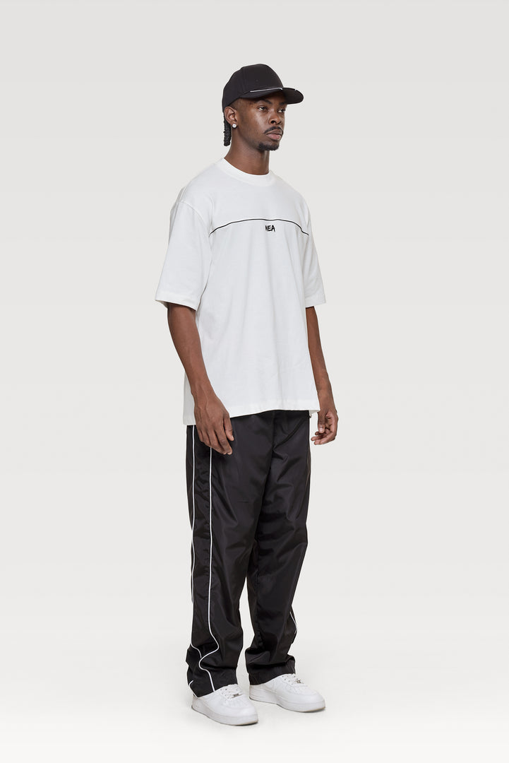 CAMISETA OVERSIZE LOCKED IN NEA