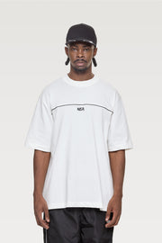CAMISETA OVERSIZE LOCKED IN NEA - MARFIL